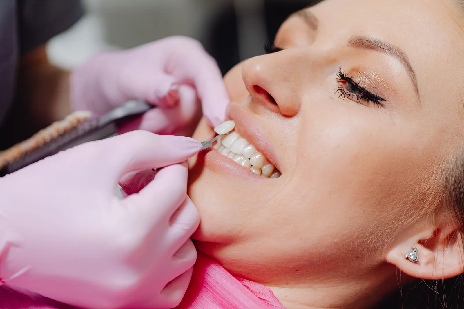 Checking gum health around the teeth, alongside the Tooth Extraction Implant explanation in Virginia Beach