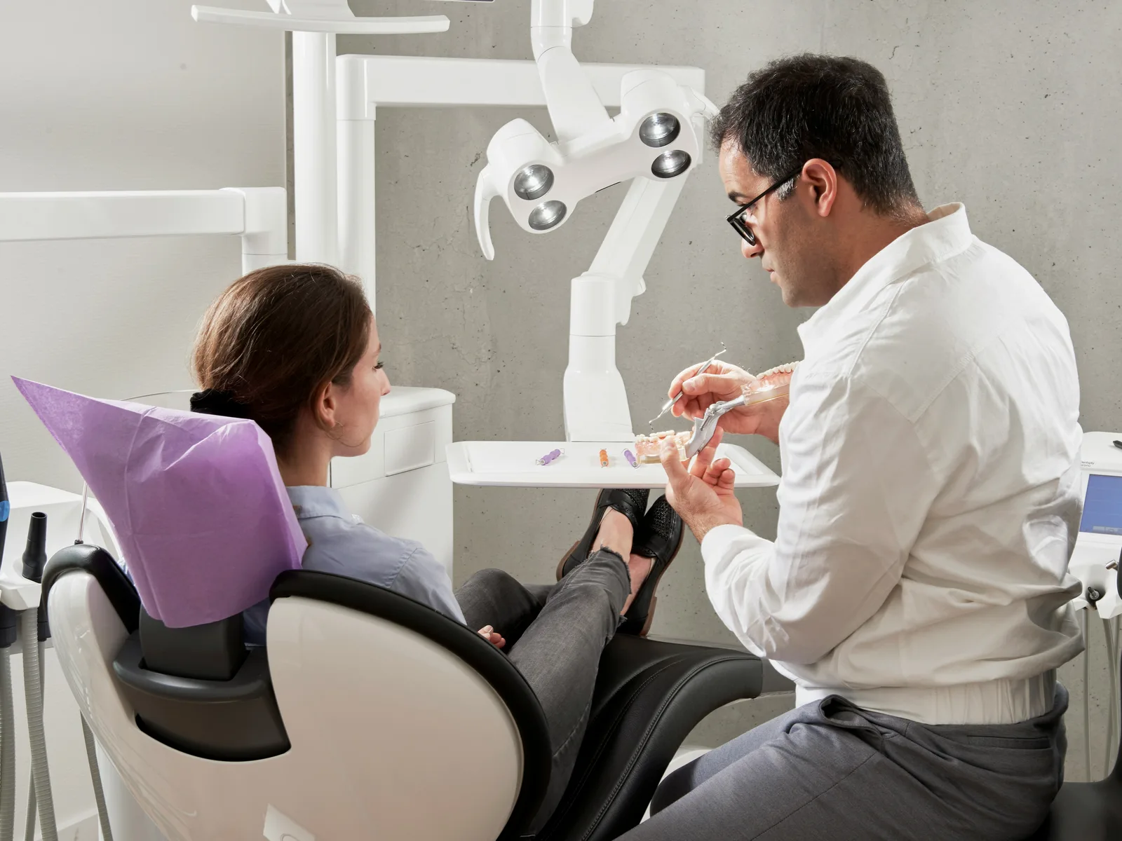 Implant consultation with a patient, at the implant practice in Virginia Beach