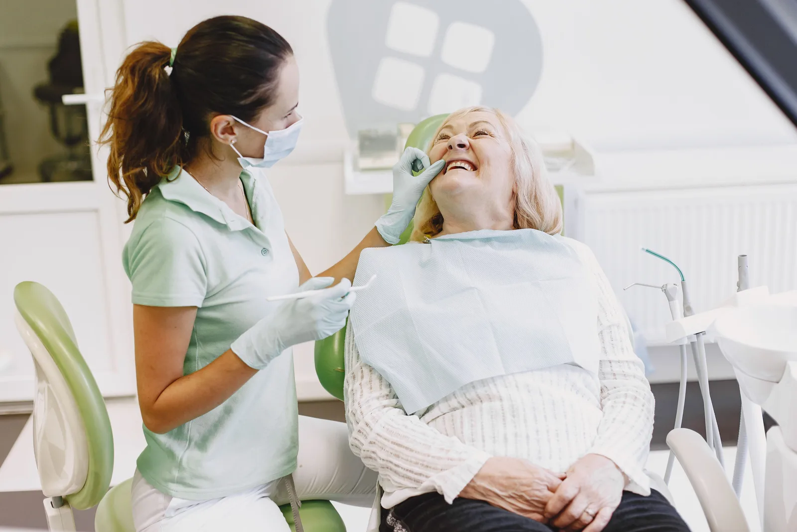 Patient at ease during a dental checkup, shown while covering Single Implant Cost in Virginia Beach