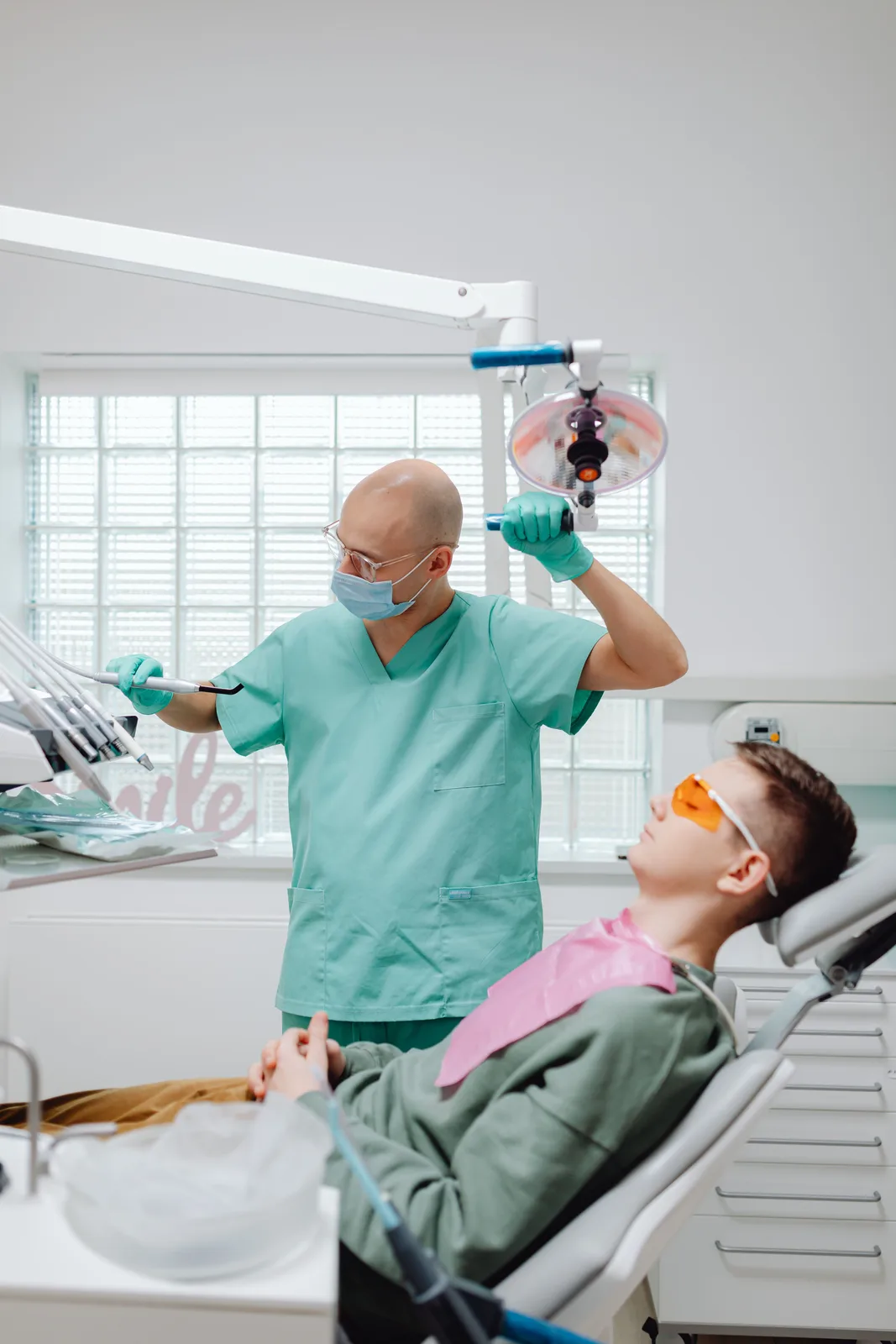 Preparing the operatory for treatment, alongside the Implants In Portsmouth explanation in Virginia Beach