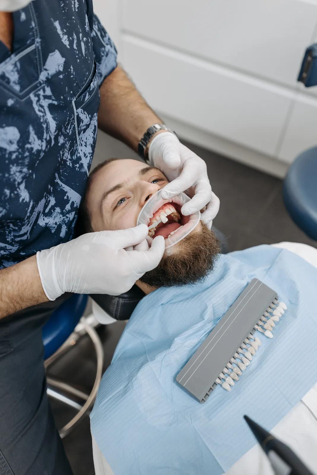Selecting a crown shade chairside, alongside the Implant Surgery Day explanation in Virginia Beach