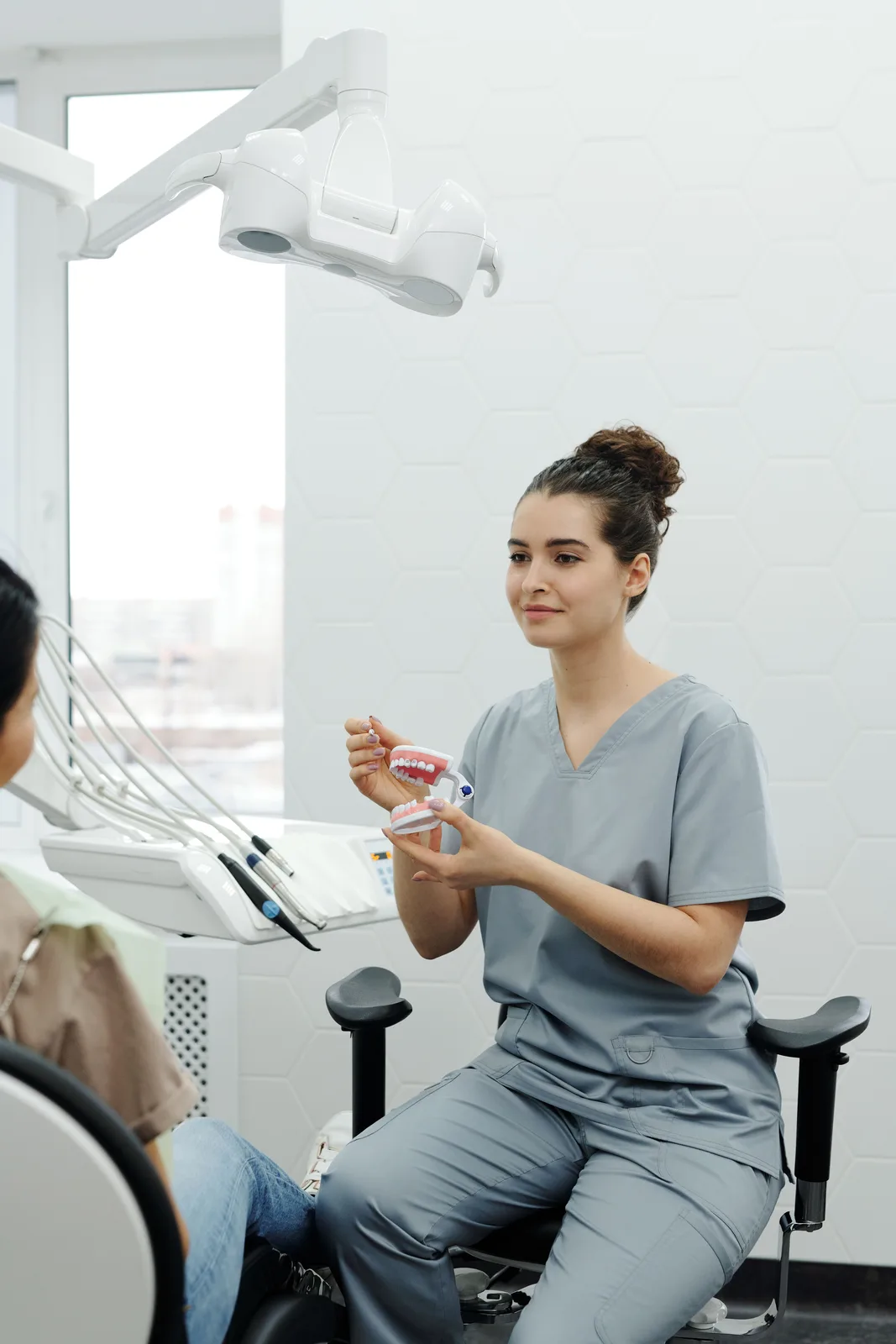 Treatment explained chairside in the operatory, shown while covering Bone Grafting in Virginia Beach